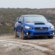 Illustration for article titled 2015 Subaru WRX STI: The Big Winged Rude Blue Rally Machine You Deserve